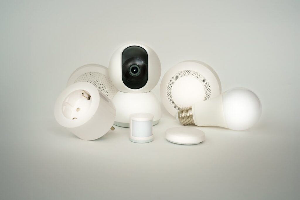 Smart home electronic devices on white background. Home automation. Remote control light equipment.