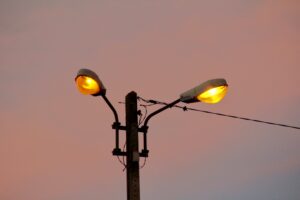 street lamp with a pink sunset background